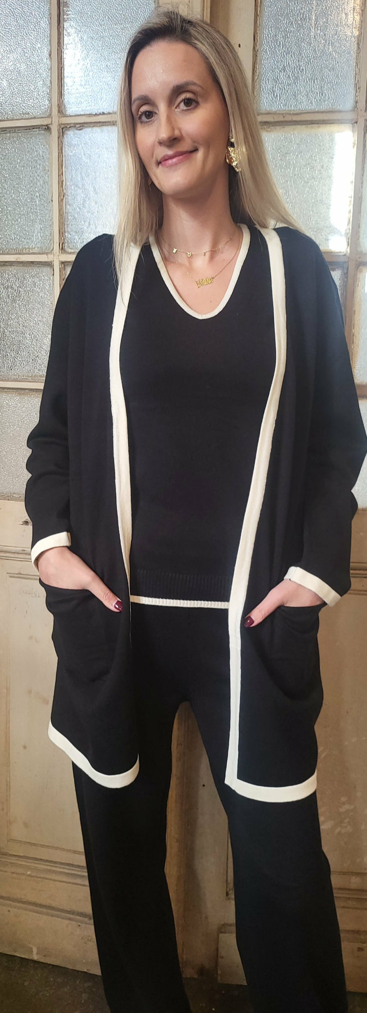 Lång kofta med fickor